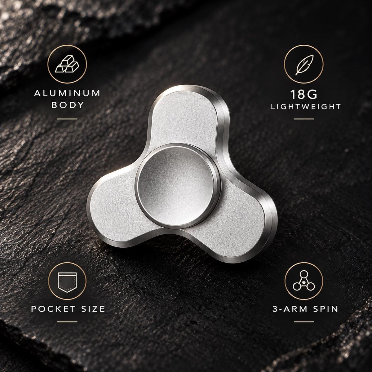 Mini spinner métallique 3 branches : finition argentée sur pierre