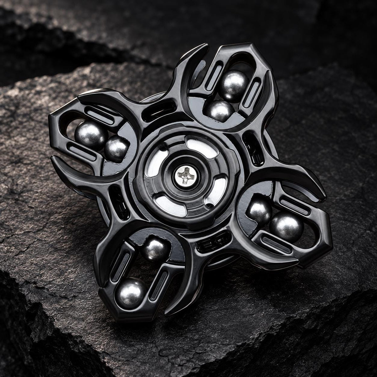 Spinner magnétique à billes d'acier : modèle noir avec billes visibles
