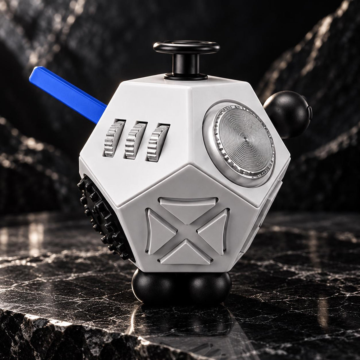 Fidget dodécaèdre 12 faces : gris à commandes bleues et noires