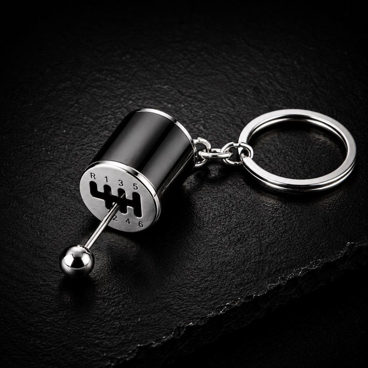 Porte-clés levier de vitesses 6 rapports : modèle noir sur pierre
