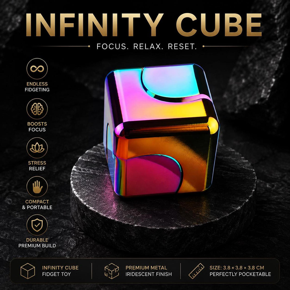 Cube spinner métallique : arc-en-ciel posé sur pierre